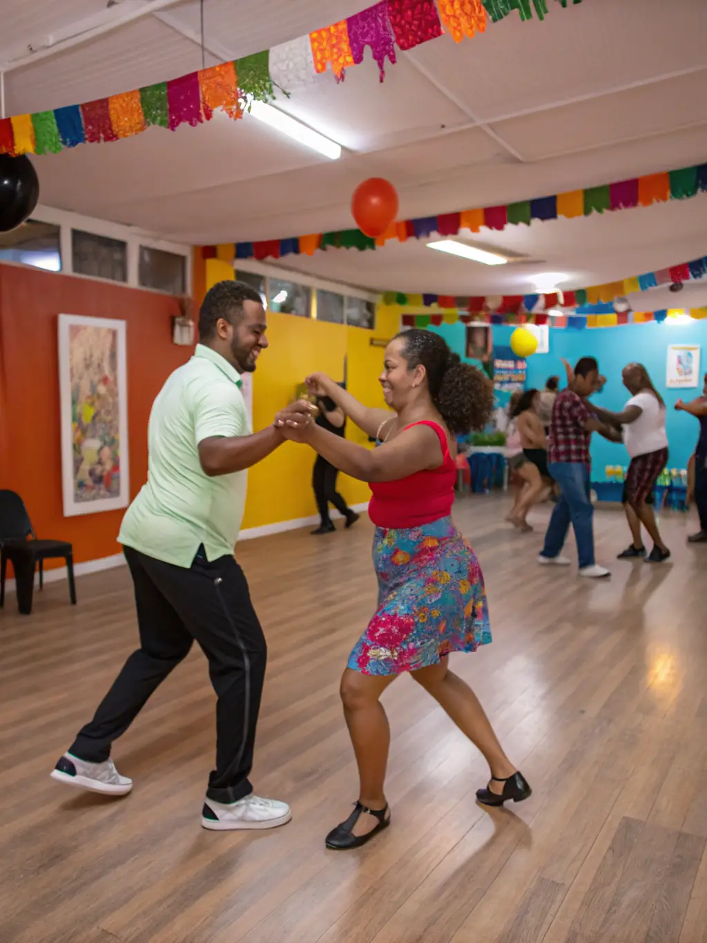 A vibrant image of participants learning salsa during a Latin dance workshop, showcasing the energy and community spirit of ENERGIE LATINE SAINTES.